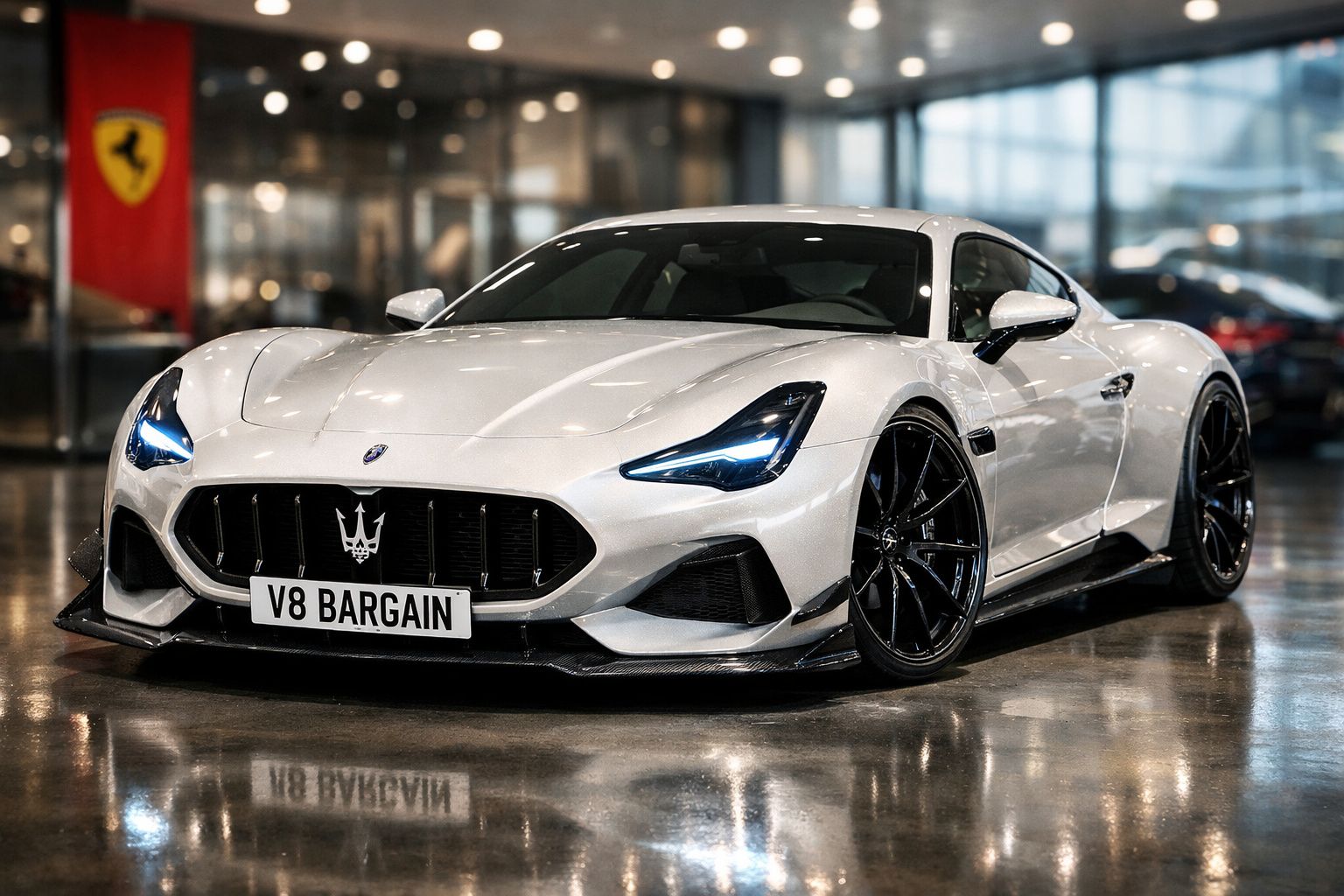 Carro desportivo branco Maserati com faróis LED azuis estacionado em interior brilhante.