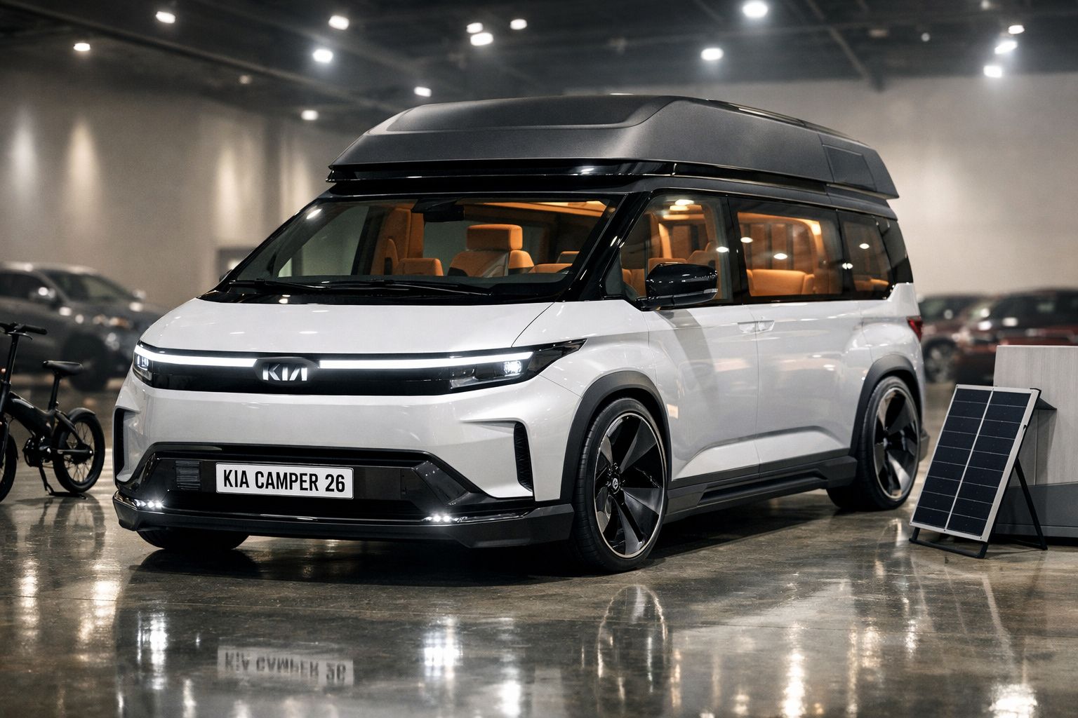 Van elétrica branca Kia Camper 26, com tejadilho alto e interior castanho, estacionada em espaço fechado.