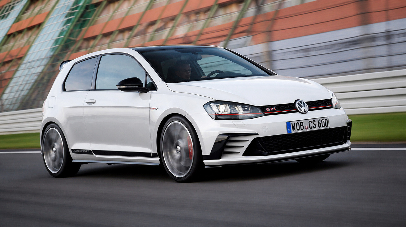 Carro desportivo Volkswagen Golf GTI branco em movimento numa estrada urbana junto a edifício colorido.